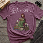 Spells & Stories - Reading Witch Sitting on a Pile of Books Graphic T-Shirt