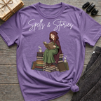 Spells & Stories - Reading Witch Sitting on a Pile of Books Graphic T-Shirt