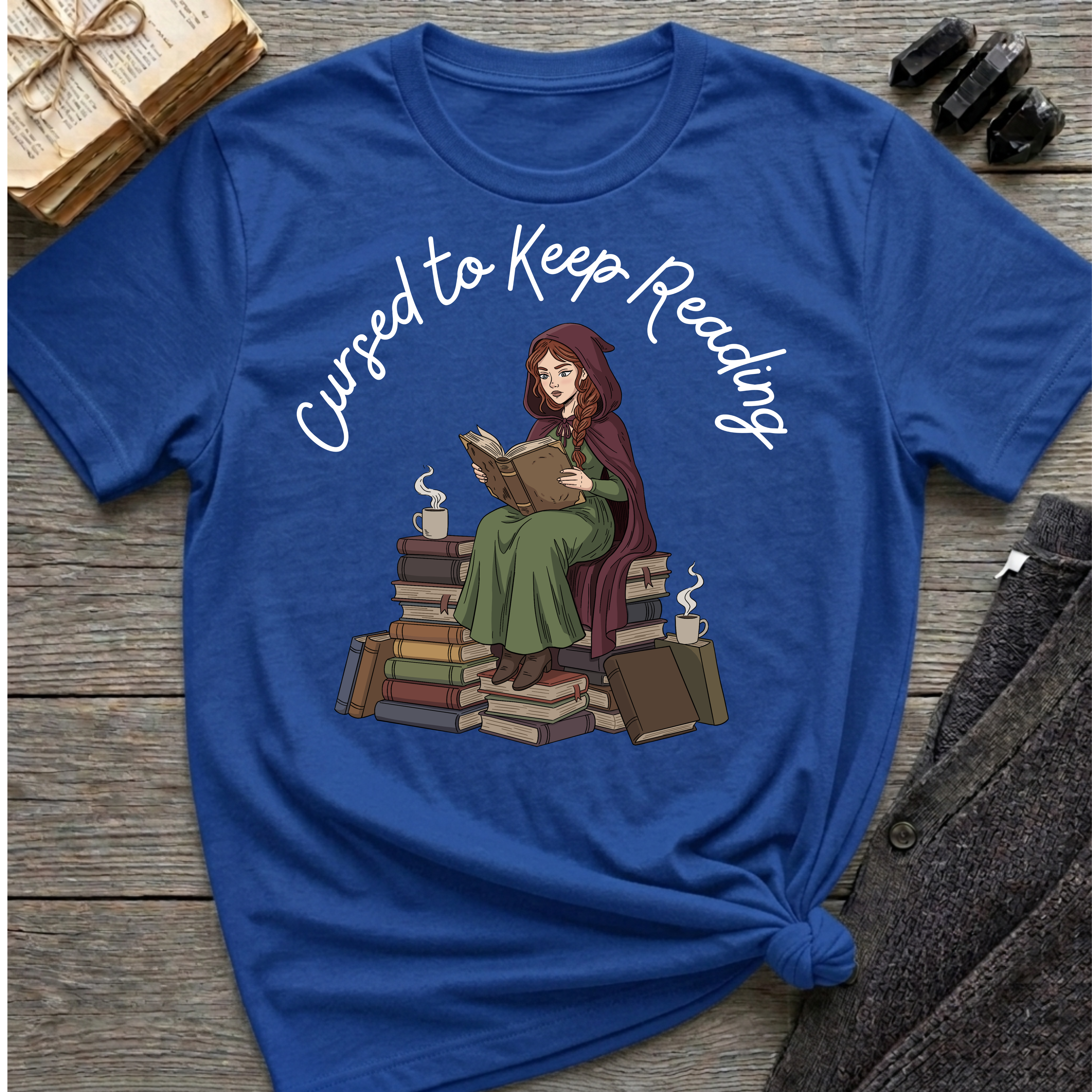 Cursed To Keep Reading - Reading Witch Sitting on a Pile of Books Graphic T-Shirt